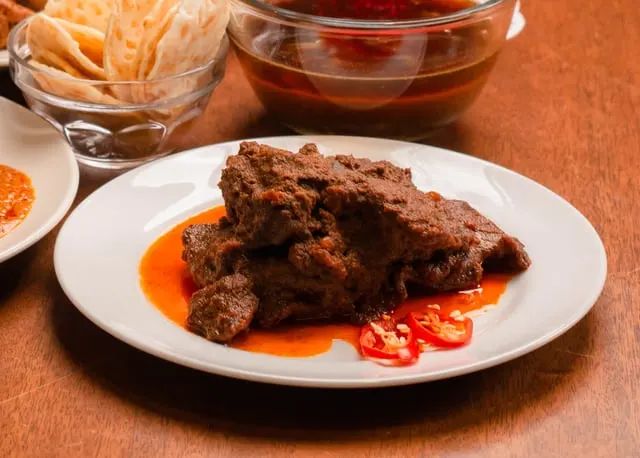 Slow-cooked beef rendang with red chilli