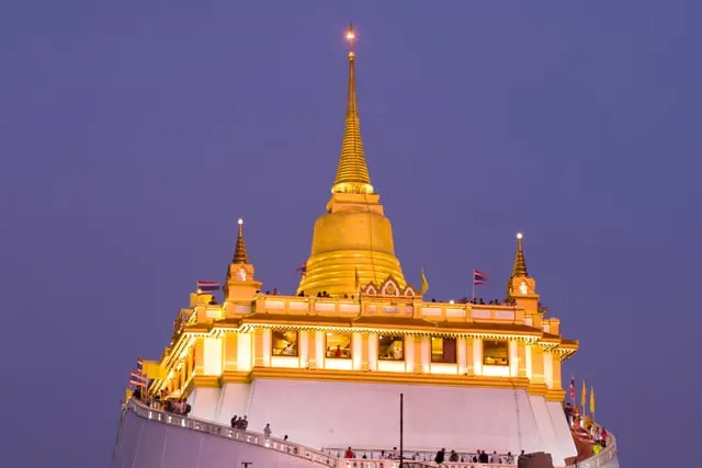 The Golden Mount chedi lit at dusk