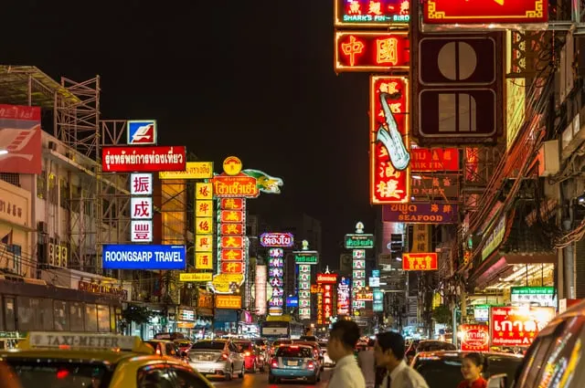 Ninara, CC BY 2.0, via Wikimedia Commons Yaowarat Road's neon signs at night