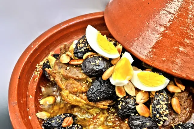 Lamb tagine with prunes, almonds and egg