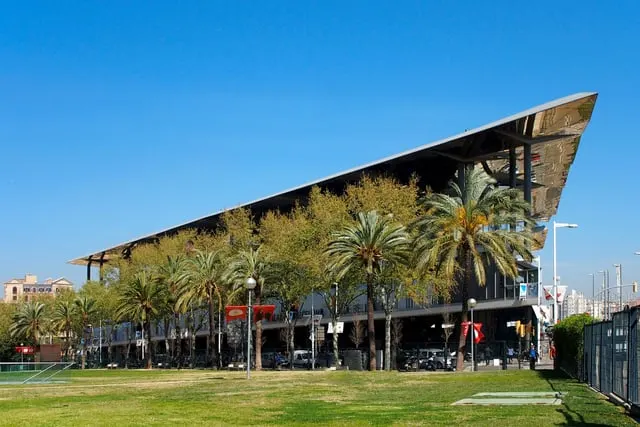 The mirrored canopy of Els Encants market, blue sky