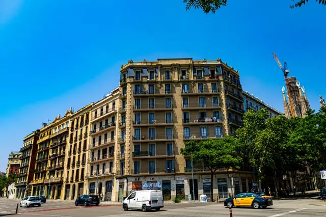A grand corner building on Passeig de Gràcia, blue sky