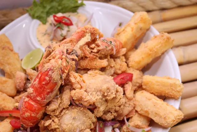 Fried lobster pieces with chilli and garlic