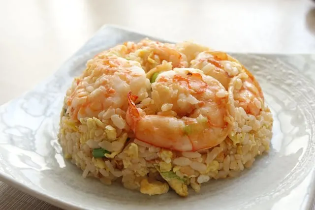 Shrimp fried rice, domed on a plate