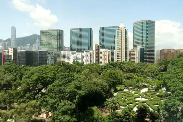 Kowloon Park's trees and maze garden below the Tsim Sha Tsui towers