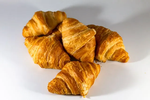 A pile of glossy croissants