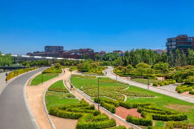 Madrid Río's lawns and paths from above, blue sky