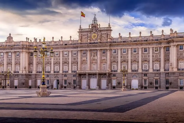 The Royal Palace from the Plaza de la Armería, bright cloud