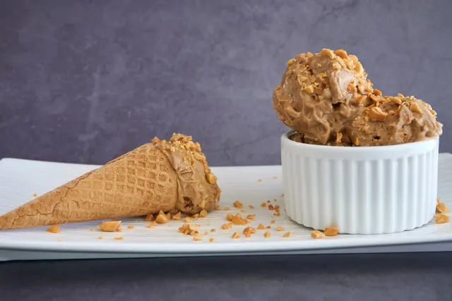 Peanut ice cream with a waffle cone