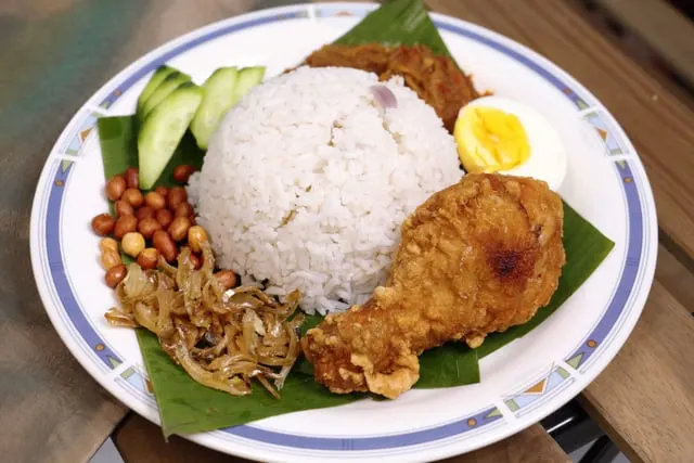 Nasi lemak with a crisp fried chicken leg and sambal