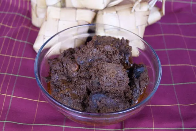 Traditional Padang beef rendang in a glass bowl